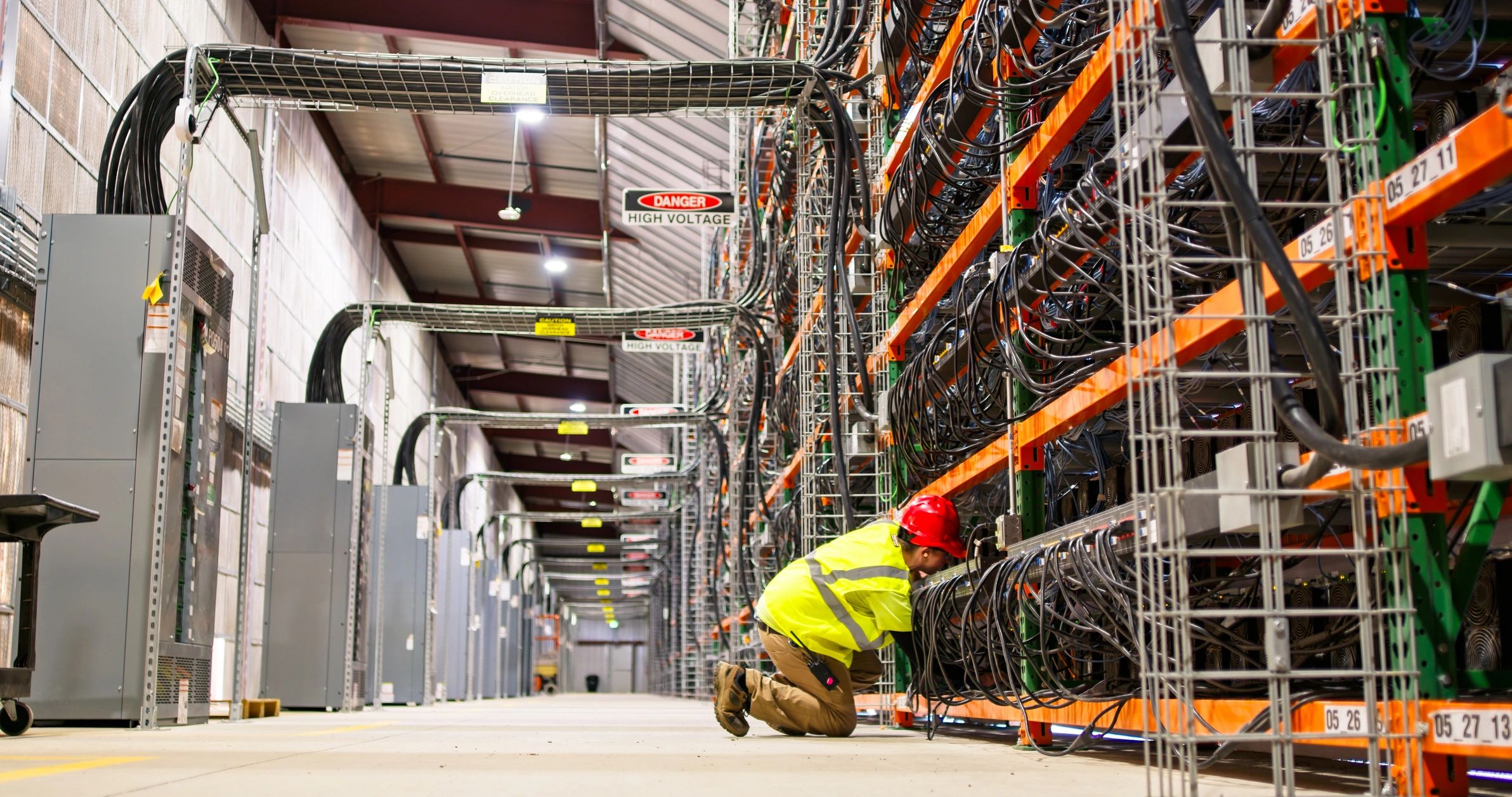 Wide Shot of Technician in Huge Data Center