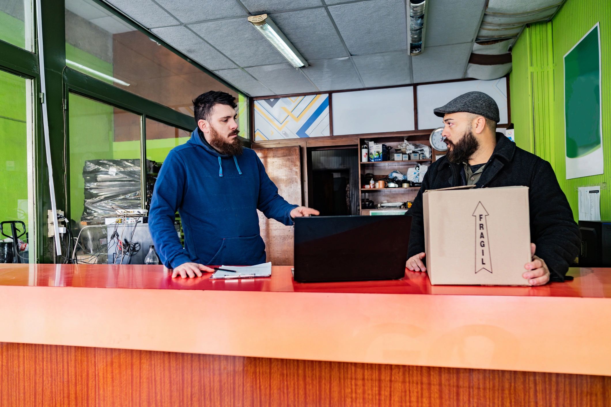 Customer receiving device service assistance at a store counter